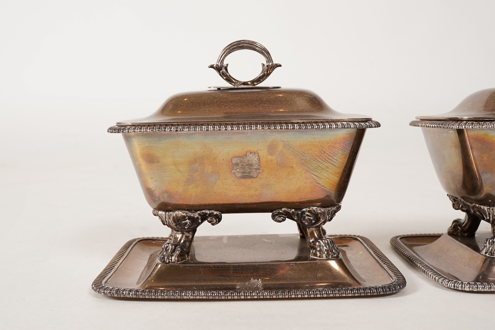 A pair of George IV silver sauce tureens with covers and integral stands, by Philip Rundell